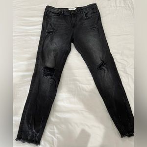 Men’s distressed black skinny jeans